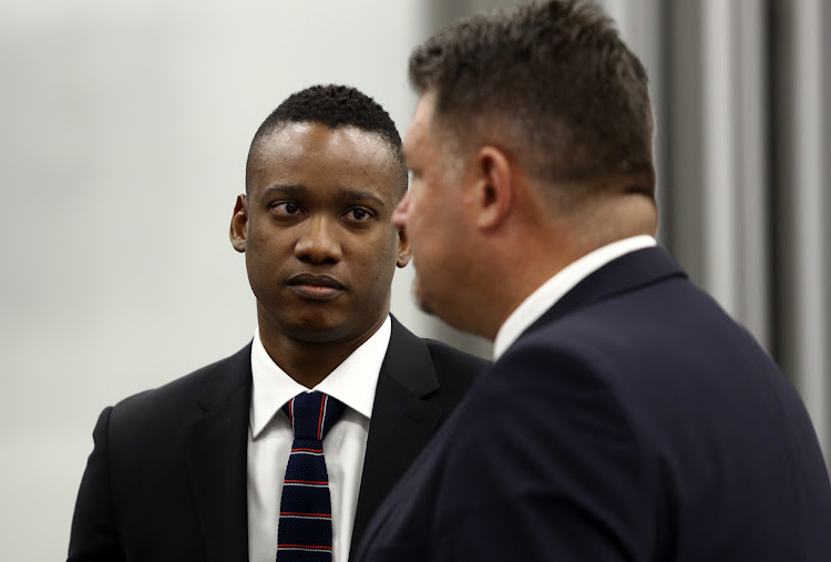 Duduzane Zuma listens to his lawyer at the State Capture inquiry in Johannesburg on Wednesday.