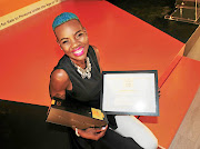 The winner of  Veuve Clicquot Elle Boss Corporate category Melody Xaba. 