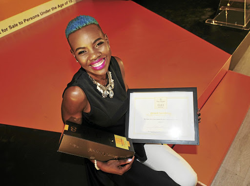 The winner of Veuve Clicquot Elle Boss Corporate category Melody Xaba.