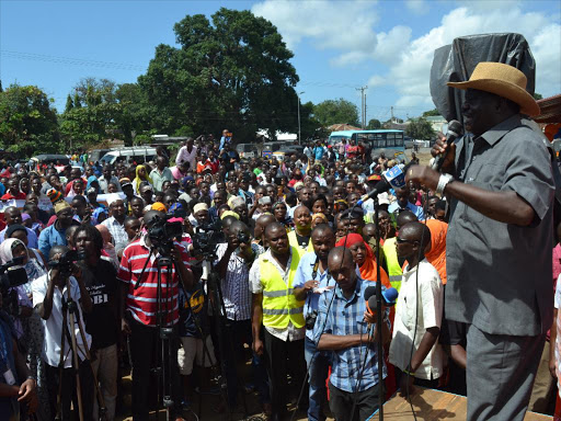 Cordleader Raila Odinga addressing locals yesterday at Ukunda in Msambweni constituency, Kwale county / ALLOYS MUSYOKA