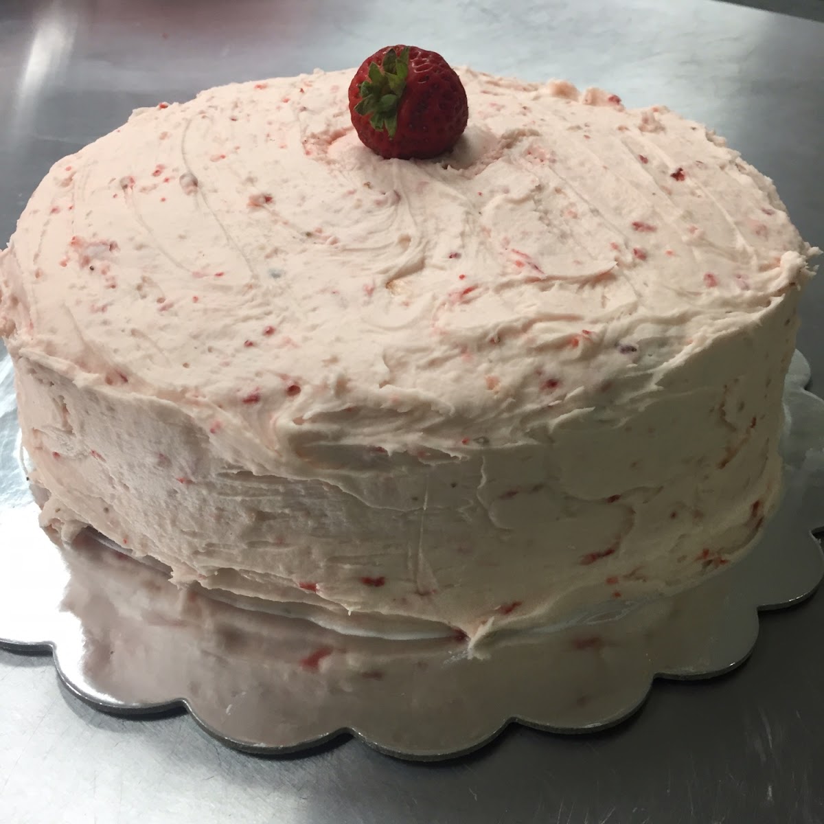 Chocolate cake with strawberry frosting