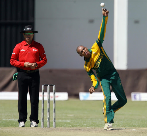 South Africa's spinner Aaron Phangiso bowls the ball during the final Triangular Series One Day International match between South Africa and Australia at Harare Sports Club on September 06, 2014 in Harare, Zimbabwe.