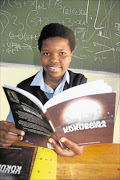 POWER OF WORDS: Sophumelela High School pupil Nomthandazo Dyamdeki with a copy of her book.
       Photo: Supplied