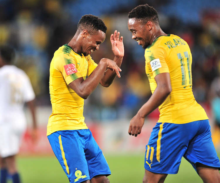 Mamelodi Sundowns midfielders Sibusiso Vilakazi and Themba Zwane celebrate after the pair scored both goals in a 2-0 Absa Premiership win over Bidvest Wits at Loftus Stadium in Pretoria on Saturday April 14 2018. With the win, The Premier Soccer League leaders Sundowns stretched their lead over second placed Orlando Pirates to six points with four matches remaining.