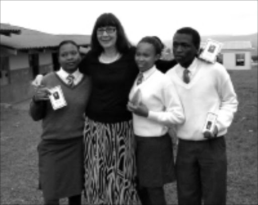 GOOD OMEN: KwaZulu-Natal education MEC Ina Cronje and some of the Grade 12 pupils of Payipini High School in Pietermaritzburg yesterday. Circa 11/2008. Pic. Mhlaba Memela. © Sowetan.