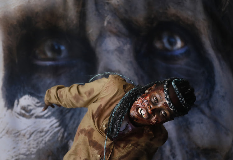 A zombie thrills visitors to the sold-out Comic Con Africa convention at the Kyalami International Convention Centre.