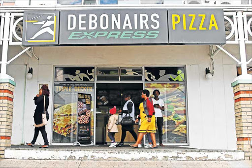HIGH DRAMA: Debonairs Pizza in Malcomess Mall was robbed by a 12-member gang on Friday amid heavy exchange of gunfire between the fleeing robbers and security guards Picture: STEPHANIE LLOYD