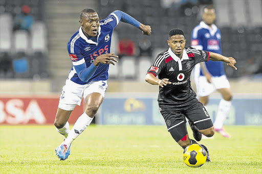 SOCCER ACES: Thandani Ntshumayelo of Orlando Pirates, right, and Tendai Ndoro of Mpumalanga Black Aces fight for possession during the Absa Premiership match between their teams at Mbombela Stadium in Nelspruit. Aces won 2-1