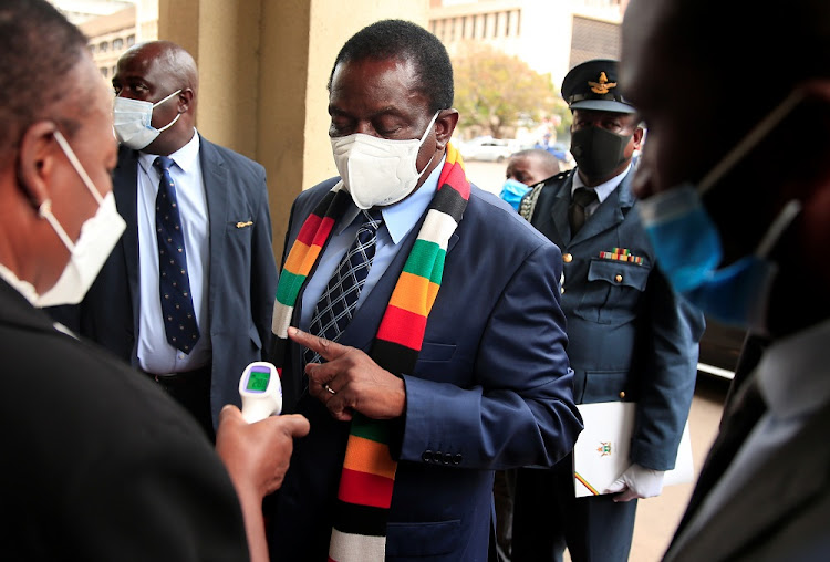 Zimbabwean President Emmerson Mnangagwa's vaccination at a public event was meant to assure citizens the vaccines were safe. File photo.
