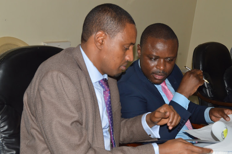 Nairobi County Executive Committee Member for Health Mohammed Dagane and the Chief Officer Washington Makodingo in consultations before the Nairobi County Assembly Committee for Health on March 26, 2019