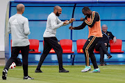 Belgium assistant coach Thierry Henry and Romelu Lukaku during training.