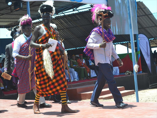 Turkana Governor Josphat Nanok(left), Deputy president (centre) and CS Eugene Wamalwa in traditional attires during the Turkana Tourism and Cultural festival On April 20th ,2018 / HESBOUN ETYANG.