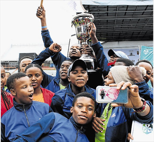 OR Tambo celebrate their overall win at the Steve Tshwete Games held in East London Picture: SISIPHO ZAMXAKA