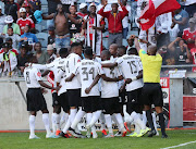 Tshegofatso Mabasa of Orlando Pirates (c) celebrates goal with teammates during the Absa Premiership 2019/20 football match between Orlando Pirates and Chippa United at Orlando Stadium, Johannesburg on 14 September 2019.