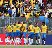 Players celebrate with goalscorer Wayne Arendse during the 2018/19 CAF Champions League football match between Sundowns and Al Ahly at Lucas Moripe Stadium, Pretoria on 06 April 2019.