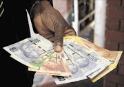 FINANCIAL GRATIFICATION: 
      Cultivating the culture of saving money early in life can reap a great and rewarding harvest later 
        PHOTO: PUXLEY MAKGATHO