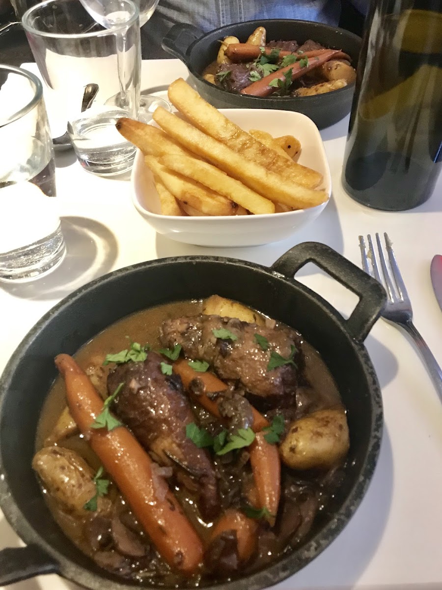 Coq au vin (front), truffle fries, and bœuf bourguignon (back). All vegan & GF.