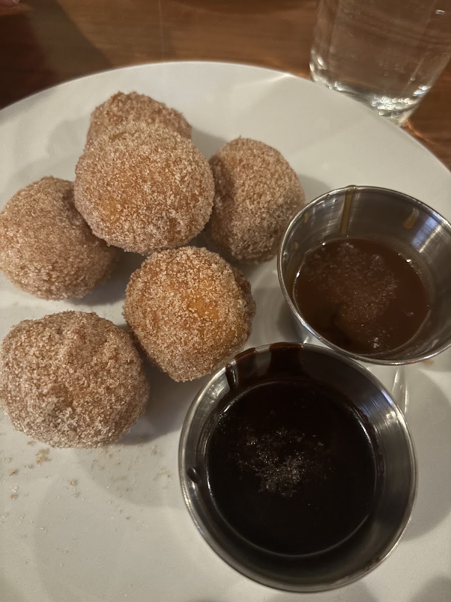 Gluten free donuts with chocolate and caramel sauce