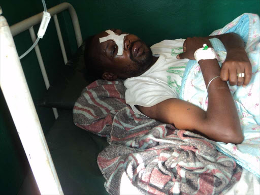 Emmanuel Letipila at Baragoi sub-county hospital where he was admitted after being attacked by a police officer. /MARTIN FUNDI