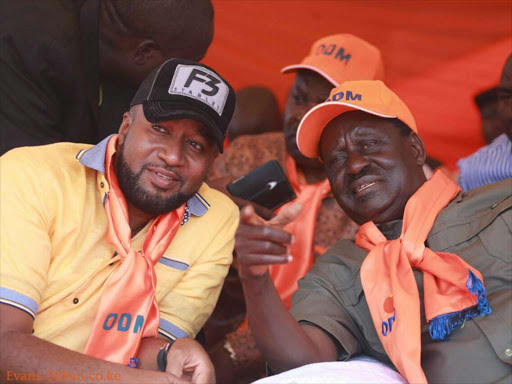 ODM deputy party leader Hassan Joho with ODM party leader Raila Odinga in Busia on JUly 21, 2016. /Evans Ouma