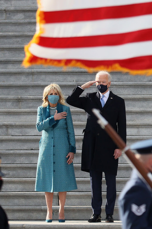 US President Joe Biden in Ralph Lauren and first lady Jill Biden in Markarian.