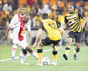 TIGHT: Ajax Cape Town's Khama Billiat dribbles past Keagan Ritchie in this MTN8 clash: PHOTO: MABUTI KALI