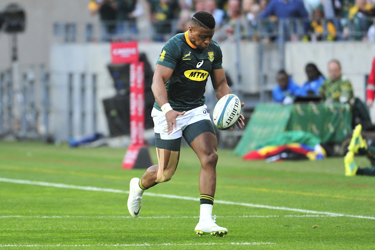 Aphiwe Dyantyi of South Africa kicks the ball forwards during the 2018 Rugby Championship game between South Africa and Australia at Nelson Mandela Bay Stadium in Port Elizabeth on 29 September 2018.