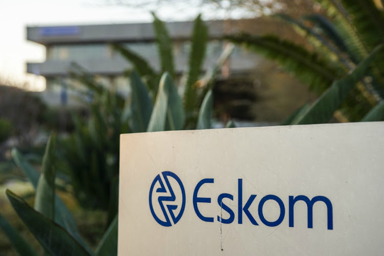 An Eskom logo is seen at the utility's Megawatt Park headquarters in Johannesburg. Picture: BLOOMBERG/WALDO SWIEGERS