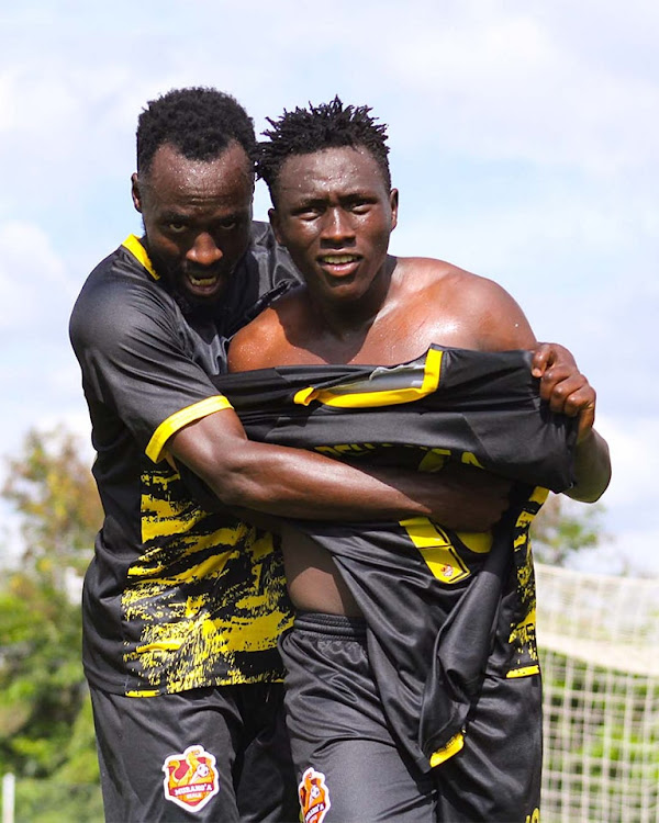 Murang'a Seal's Cornelius Juma and Titus Kapchanga celebrate in a past match