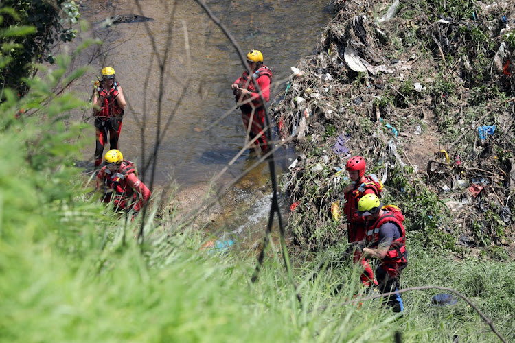 A rescue team combs the Jukskei River for the bodies of congregants who lost their lives during a baptism ceremony.. File photo.