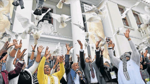 STRIVE FOR PEACE: Premier Phumulo Masualle and cabinet members, including MEC Pemmy Majodina, Mlibo Qoboshiyane and OR Tambo mayor Nomakhosazana Meth release 100 doves to commemorate the fourth anniversary of Nelson Mandela’s death, yesterday Picture: LULAMILE FENI