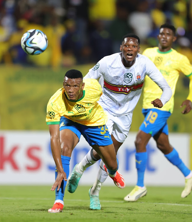 Mamelodi Sundowns defender Mothobi Mvala challenged by Kamohelo Pheeane of University of Pretoria during their Nedbank Cup quarterfinal clash at Lucas Moripe Stadium on Friday.