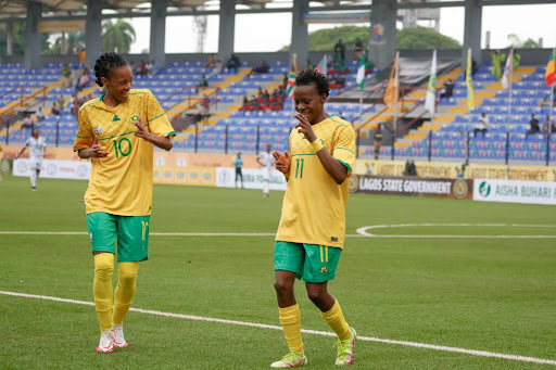 Banyana Banyana striker Thembi Kgatlana (right) celebrates with teammate Linda Mothlalo after scoring the second goal against Ghana in the the Aisha Buhari Cup match at the Mobolaji Johnson Stadium in Lagos on Friday afternoon.