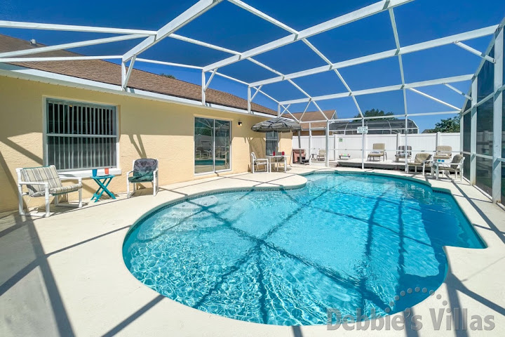 Private south-facing pool deck at this Kissimmee vacation villa