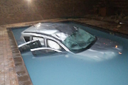 The SUV driver fell ill and crashed the vehicle into the pool.