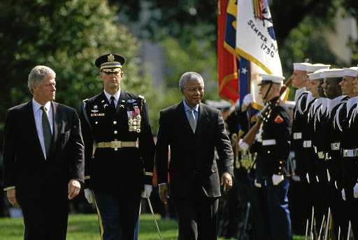 South Africa's first democratically elected president, Nelson Mandela, during welcoming ceremonies at the Clinton White House.