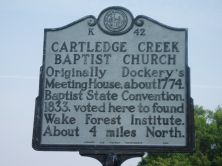 Originally Dockery's Meeting House, about 1774. Baptist State Convention, 1833, voted here to found Wake Forest Institute. About 4 miles North.Plaque via North Carolina Highway Historical Marker...