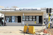 POT HOLES: Roadworks outside an African Bank branch in Johannesburg. The ailing lender, which is being rescued by the Reserve Bank, needs to lure depositors to finance lending amid fears that equity and bond investors may shun it Picture: BLOOMBERG