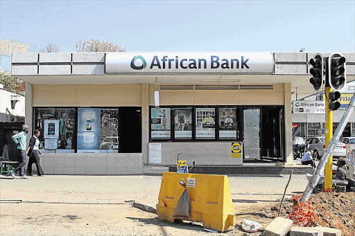 POT HOLES: Roadworks outside an African Bank branch in Johannesburg. The ailing lender, which is being rescued by the Reserve Bank, needs to lure depositors to finance lending amid fears that equity and bond investors may shun it Picture: BLOOMBERG