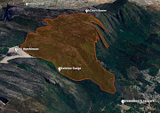 An estimated 220ha of veld have burnt.