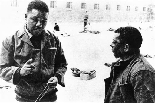 POWERFUL PRISONERS: Nelson Mandela talks to Walter Sisulu on Robben Island in 1966