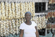 IT'S MY BUSINESS: Sarah Mathebula of Diepsloot near Johannesburg runs a vegetable business in the informal settlement. PHOTO : ANTONIO MUCHAVE