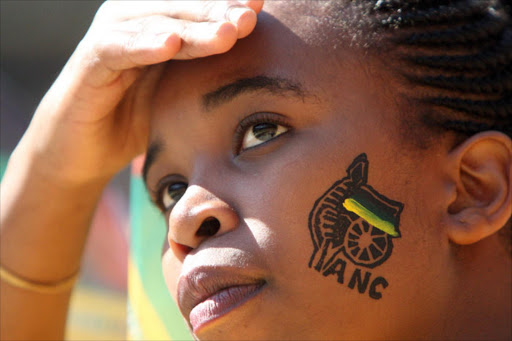 An ANC supporter at the Siyanqoba Rally held at the FNB Stadium. Photo: ANTONIO MUCHAVE