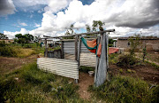 FILE PICTURE: February 01,2014.UNFIT: The ’toilet’ at Moletshi Crèche, left, which  Michael   Komape  attended last year. Children use buckets in a shack to relieve themselves. Pic: Simphiwe Nkwali. © Sunday Times.