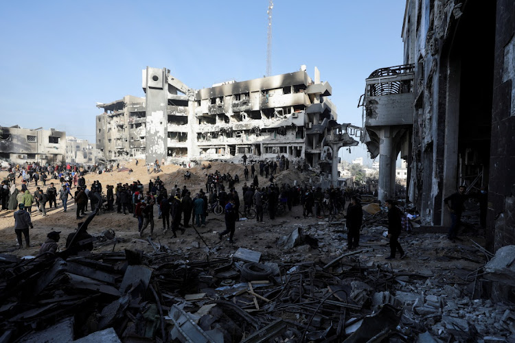 Palestinians inspect the damages at Al-Shifa Hospital in Gaza City on April 1 2024. Israeli forces withdrew from the hospital and the surrounding area after a two-week operation, amid the ongoing conflict between Israel and Hamas. Picture: REUTERS/DAWOUD ABU ALKAS