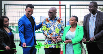 Minister of Sports, Arts and Culture, Nathi Mthethwa (M) at the new multipurpose sports court at Soshanguve South Secondary School on the outskirts of Pretoria.