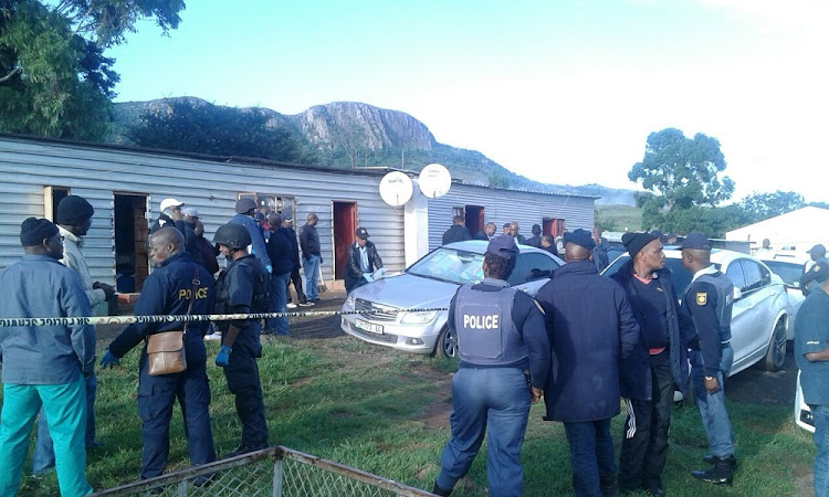 Police outside Mancoba Seven Angels Ministry at Ngcobo in the Eastern Cape.