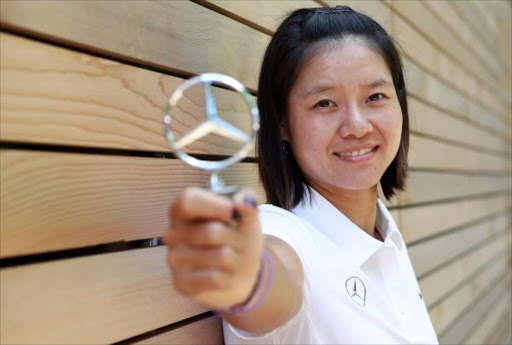 Tennis player Li Na of China, announced as global ambassador for Mercedes-Benz, poses for a photo before attending a press conference on June 19, 2011 in Wimbledon, England. (Photo by Julian Finney/Getty Images)