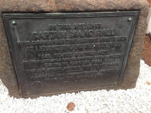 ON THIS SITE LIVED CAPTAIN ISAAC HALL WHO COMMANDED THE MEDFORD MINUTE MEN AT LEXINGTON AND BUNKER HILL PAUL REVERE STOPPED HERE ON HIS MEMORABLE RIDE TO CONCORD APRIL 18-19 1775 TO WARN CAPTAIN...