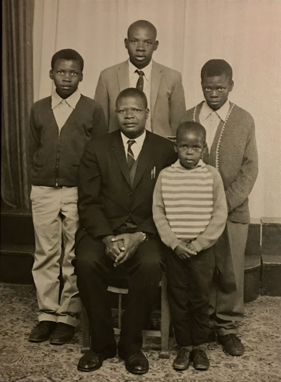 While growing up, siblings, cousins and other relatives made up Mathivha’s extended family. Here her father (seated) is pictured with her three brothers and Crause Mabudafhasi, a relative on her father’s side.
